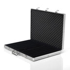 Open empty silver aluminium poker chip case with black foam lining and compartments
