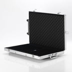 Open empty silver aluminium poker chip case with black foam lining