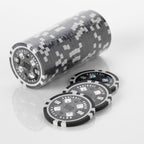 Stack of black and white Squirrel Poker Club poker chips with three loose chips in front of it