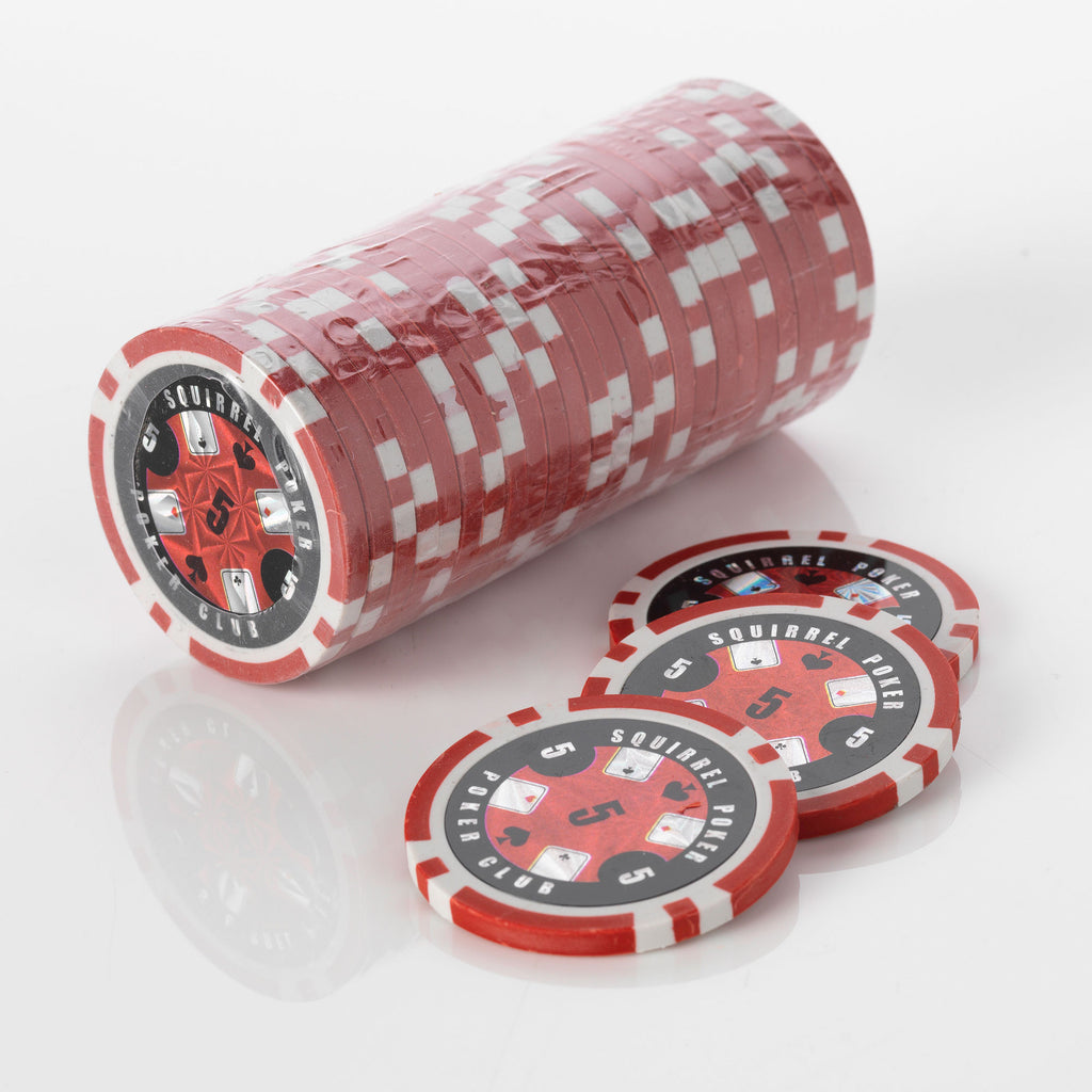 Stack of red and white Squirrel Poker Club poker chips with three loose chips in front of it