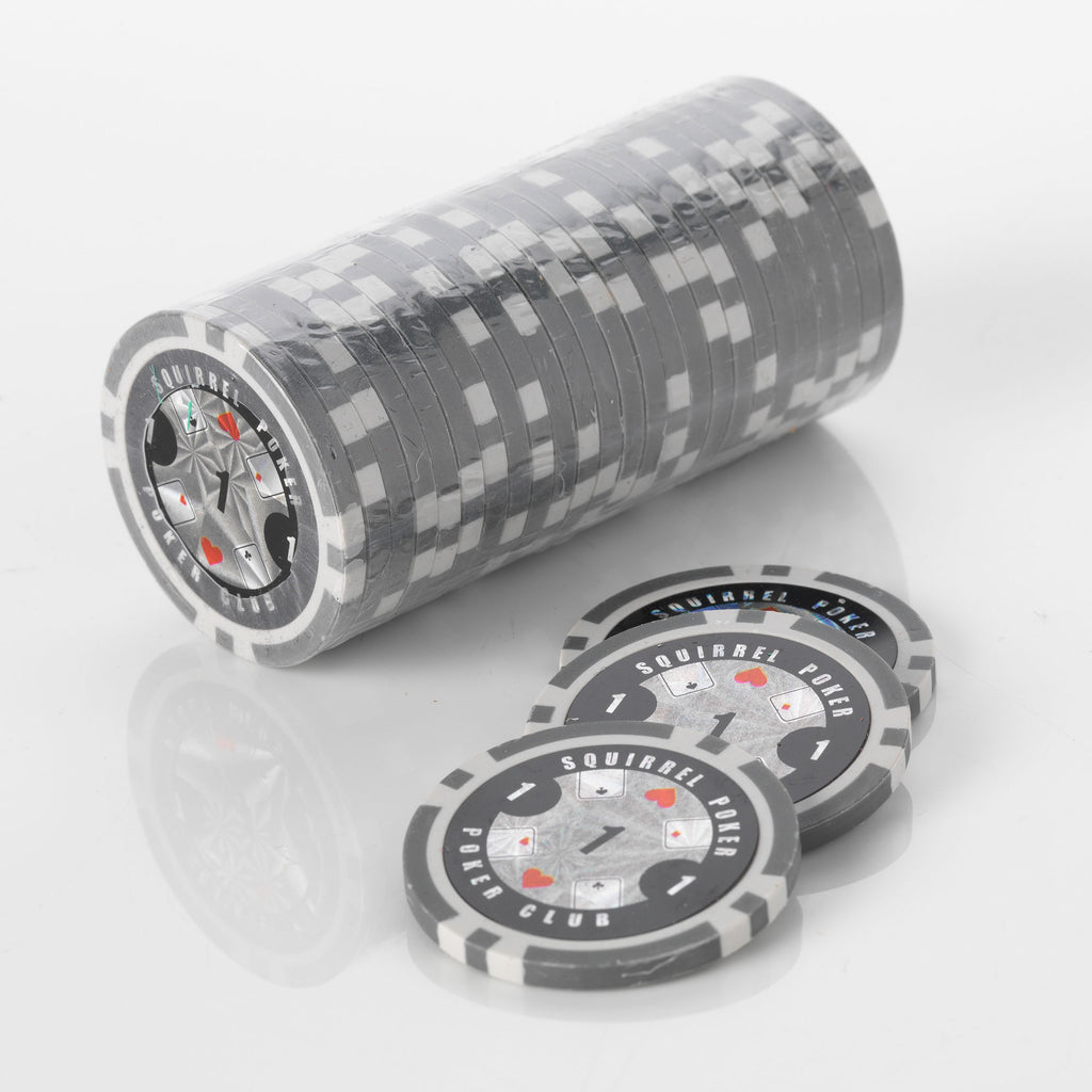 Stack of grey and white Squirrel Poker Club poker chips with three loose chips in front of it