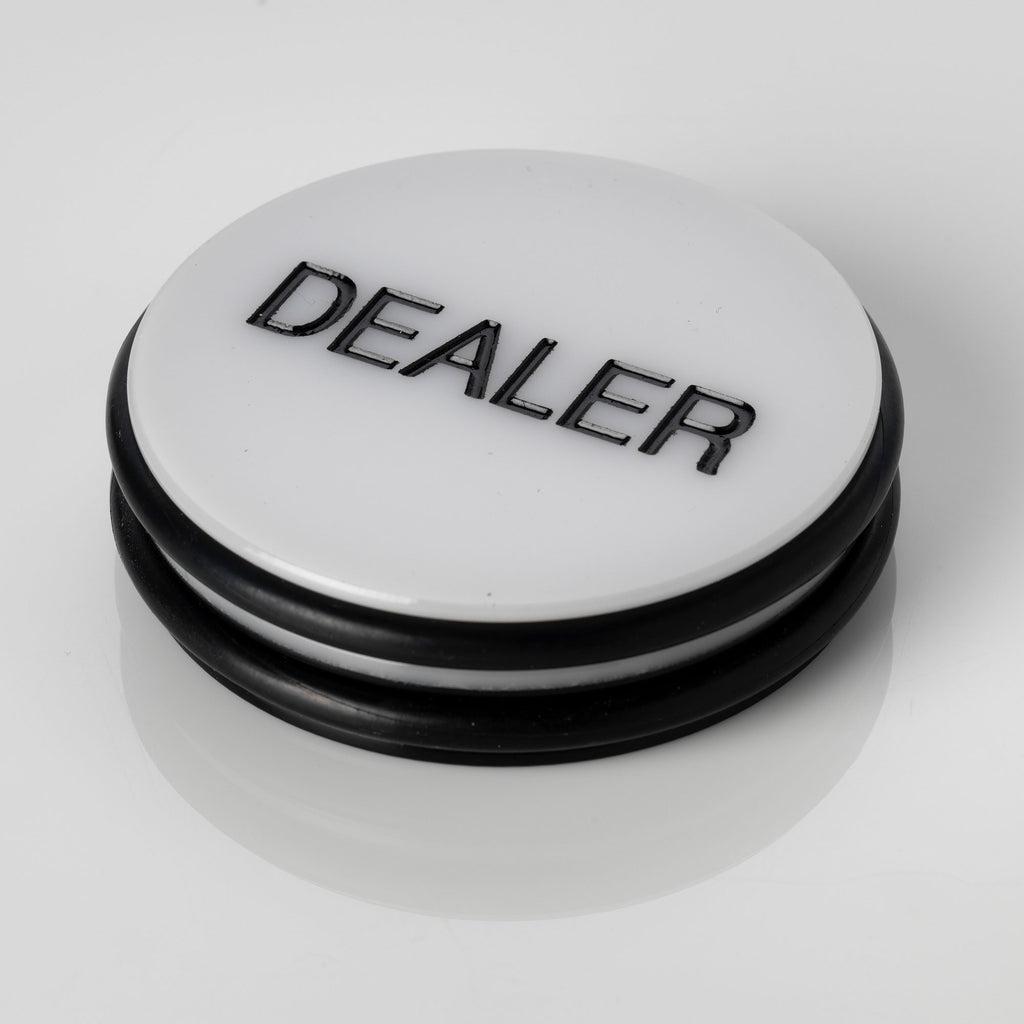 Large white 3 inch poker dealer button with DEALER printed in black lettering