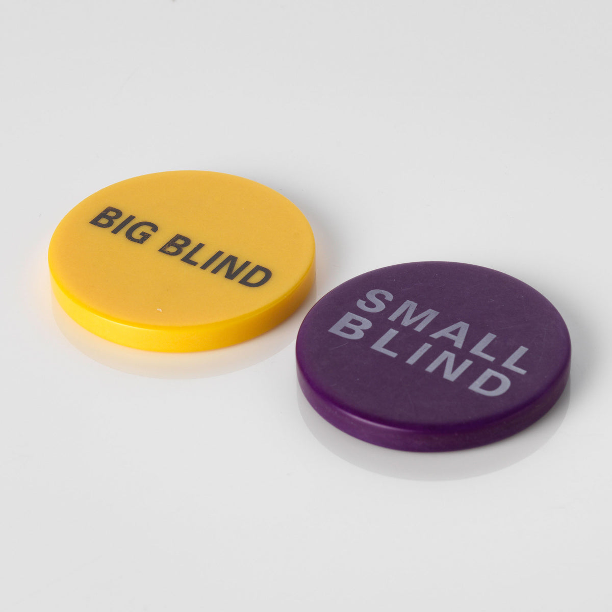 Yellow Big Blind button and purple Small Blind button for poker games