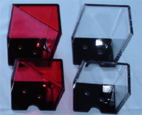 Red and clear acrylic blackjack discard holders shown from different angles
