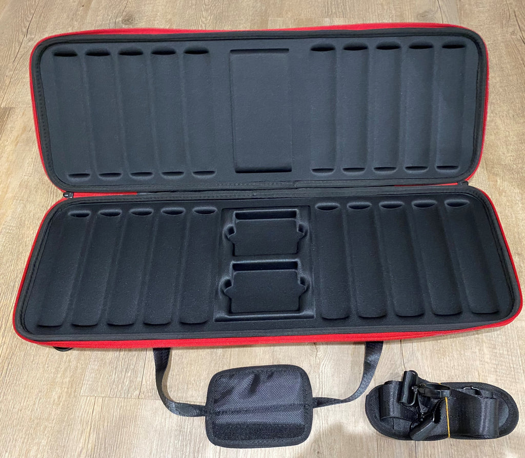 Open black EVA poker chip case with red trim, shown with its carry pouch and detachable strap