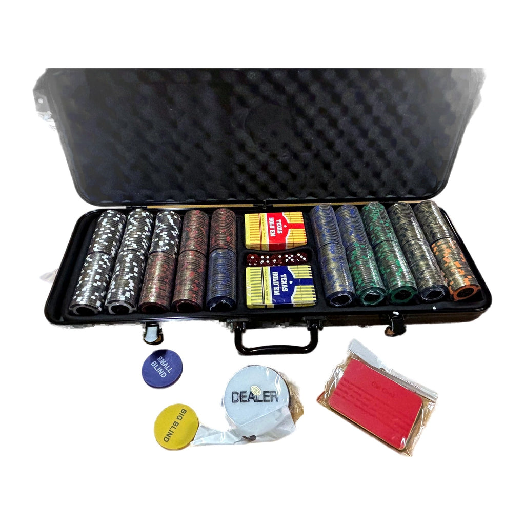 Open black poker case holding rows of poker chips, playing cards and dealer buttons