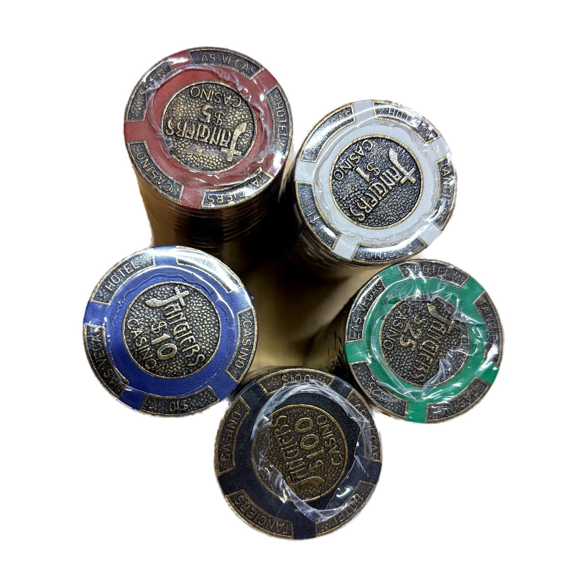 Overhead view of five stacks of poker chips in red, white, blue, green and black