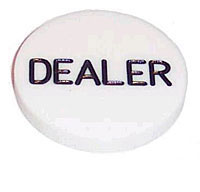 White round poker dealer button with the word DEALER printed in black