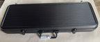 Closed black ridged aluminium poker chip case with silver corners and carry handle