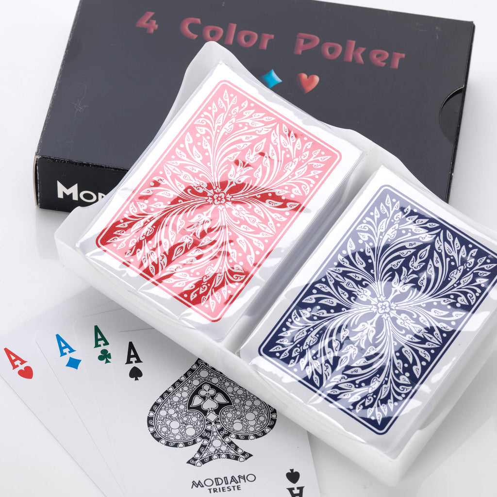 Red and blue Modiano plastic playing card decks in cases with four aces fanned out