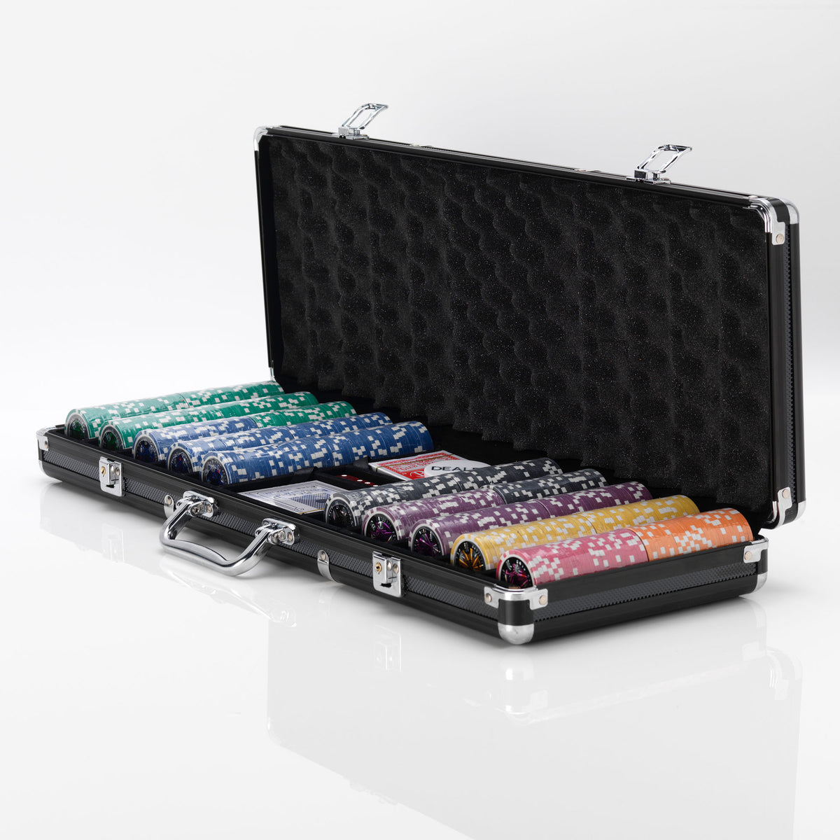 Open black aluminium case filled with rolls of Poker Club poker chips