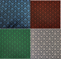 Four swatches of two tone poker speed cloth in blue, red, green and grey