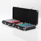 Open black aluminium poker case holding rows of Ultimate poker chips in red, green, blue and silver, on a white background